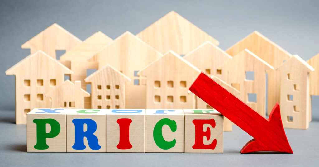 What should you do with rental prices on your Long Beach property with a coming recession? Red arrow pointing down, decreased price on rentals (wooden houses).